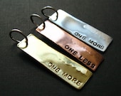 Custom Stamped tag pendant- single offset word in aluminum ,copper or brass