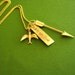 Hunger Games Necklace - Girl on Fire - Mockingjay and Arrow in brass and gold plated - Katniss Everdeen