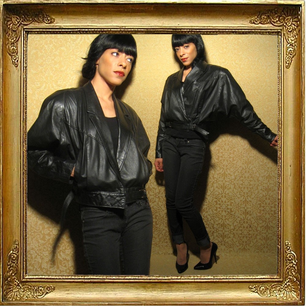 80s batwing black leather rocker jacket. sz M.