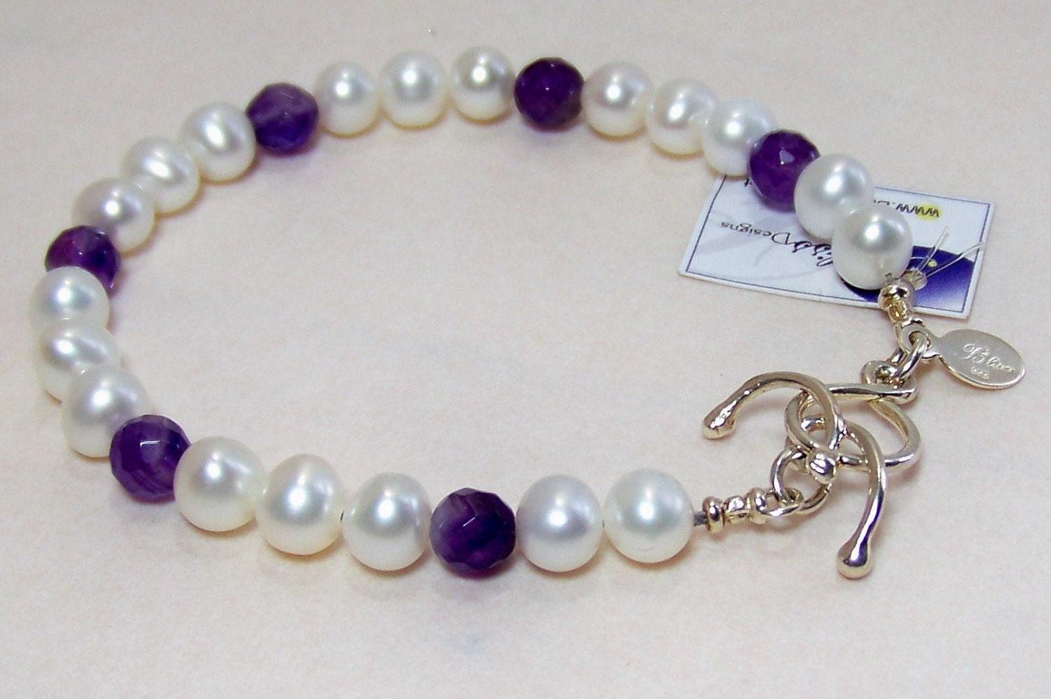 White pearl and amethyst bracelet