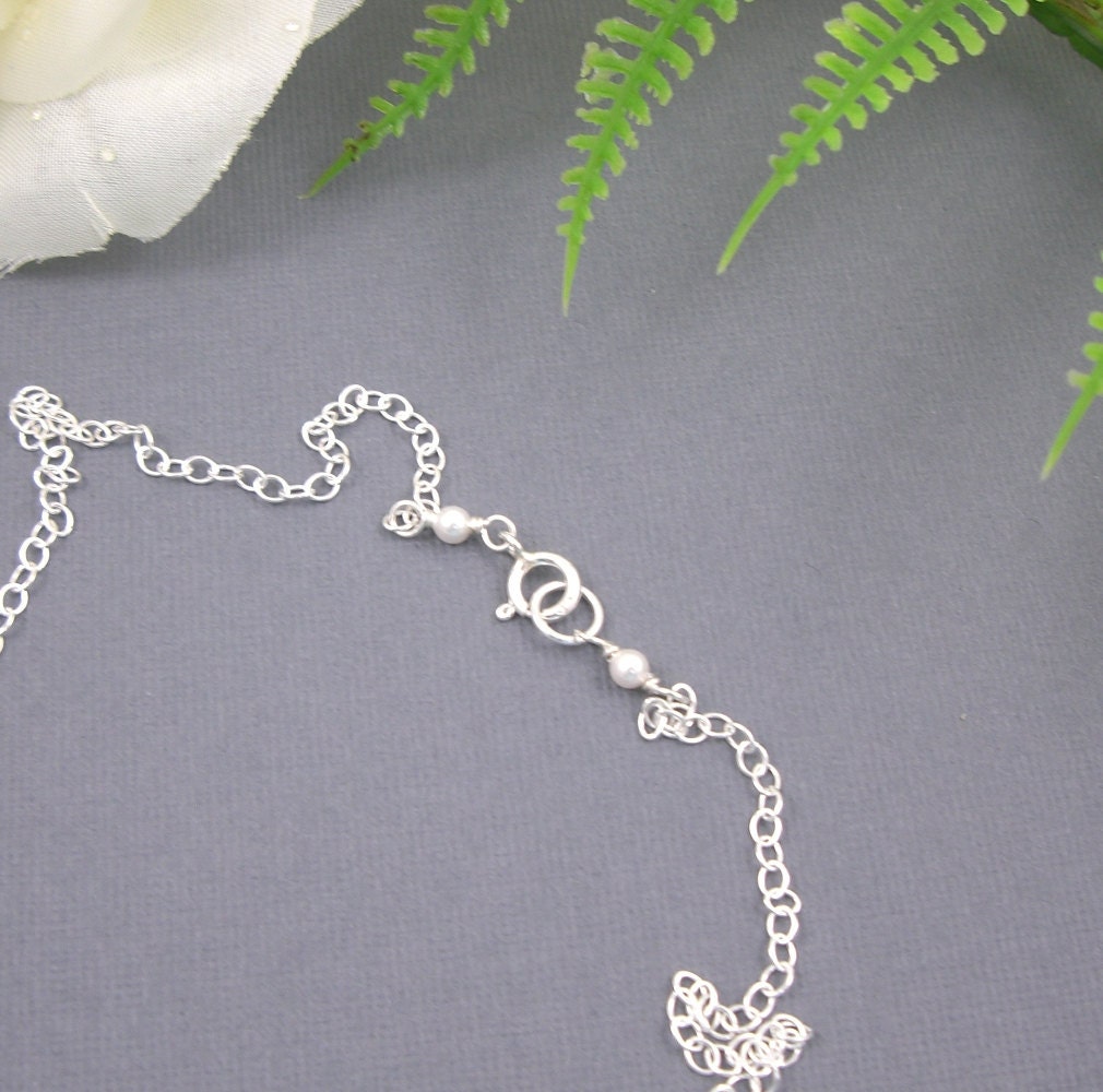Love birds on a branch with personalized hand stamped initial leaf necklace