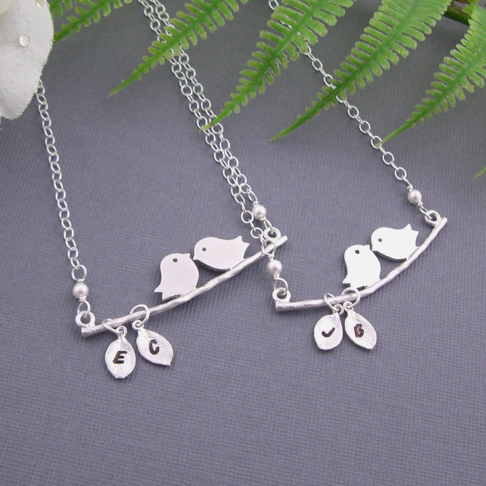 Love birds on a branch with personalized hand stamped initial leaf necklace