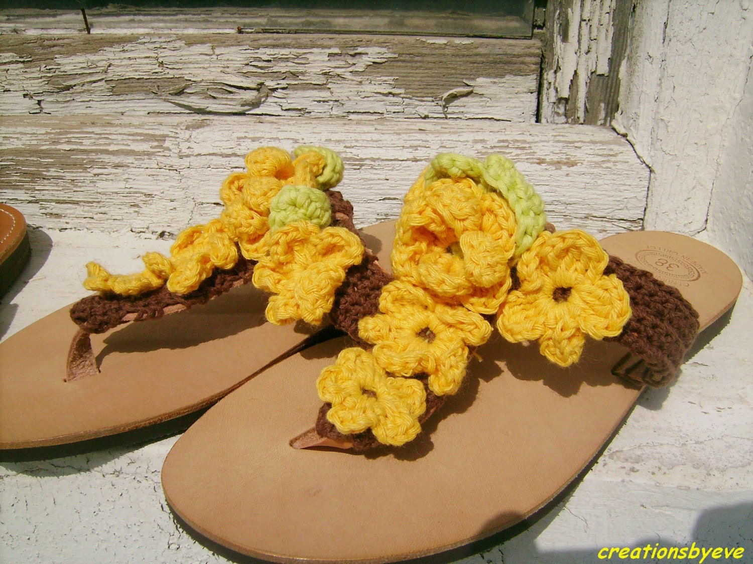 Sandals with yellow crochet flowers