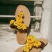 Sandals with yellow crochet flowers