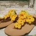 Sandals with yellow crochet flowers