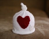 Little knit hat with the big heart.  WHITE.  Sizes newborn to big kid available. VALENTINES DAY