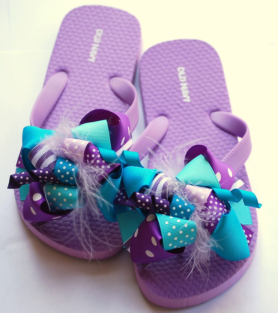 boutique FUNKY fun PURPLE and TURQUOISE bow flip flops