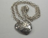 Handmade Antiqued Precious metal clay embossed heart