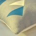 Decorative grey linen pillow cover with geometric tribal pattern