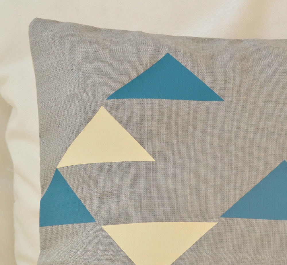 Decorative grey linen pillow cover with geometric tribal pattern