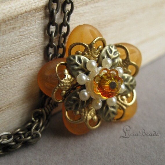 Orange flower pendant with gold filigree and a swarovski crystal