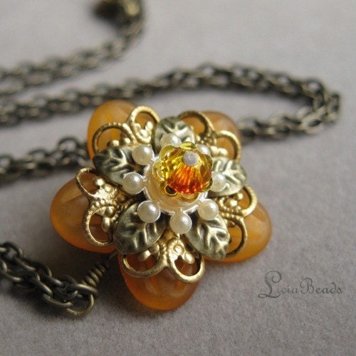 Orange flower pendant with gold filigree and a swarovski crystal