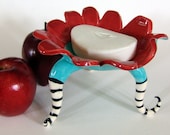 whimsical ceramic dish w/ curly striped legs