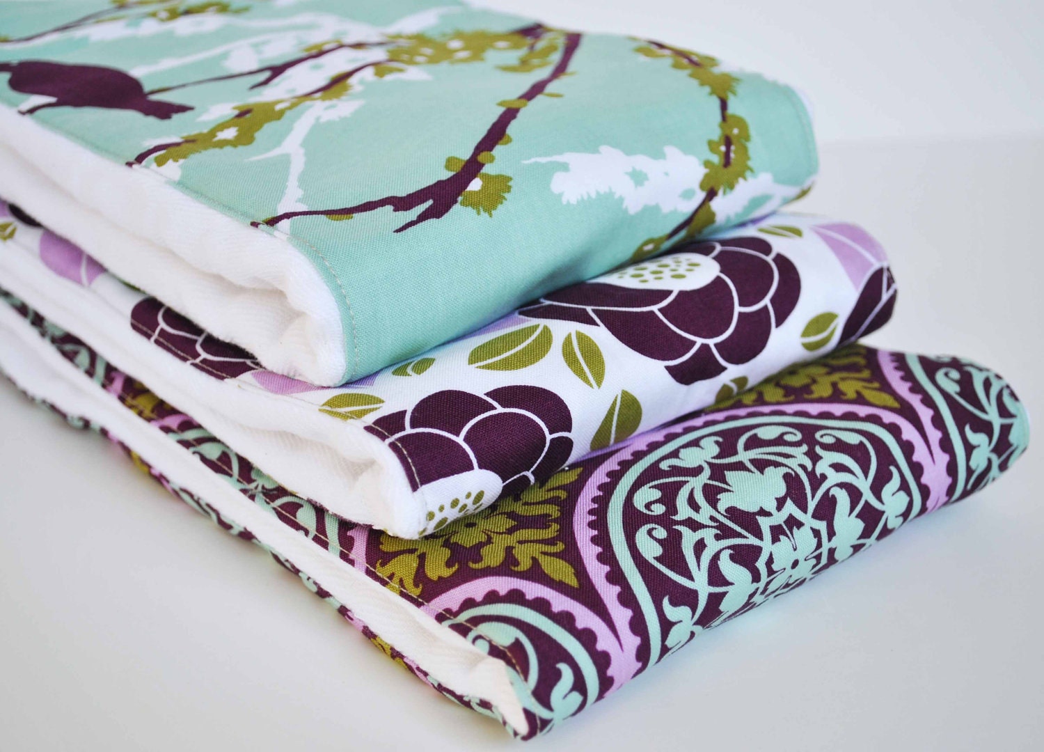 PURPLE AVIARY........ (3) very ABSORBENT 100% cotton baby burp cloths with coordinating fun cotton print......very useful gift