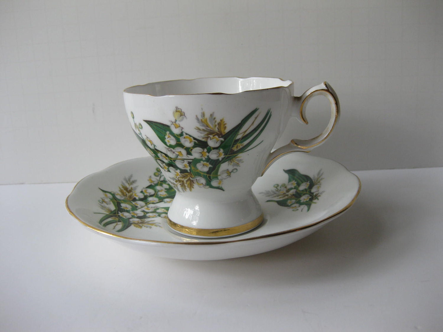 RESERVED FOR MARGO Vintage Queen Anne Musical Lily of the Valley Teacup & Saucer