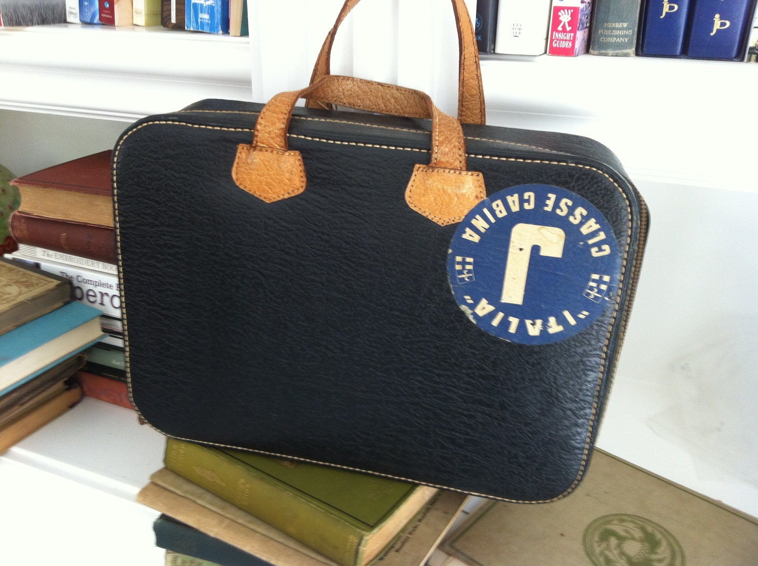 vintage leather carry-all with Italia cruise sticker - suitcase - luggage