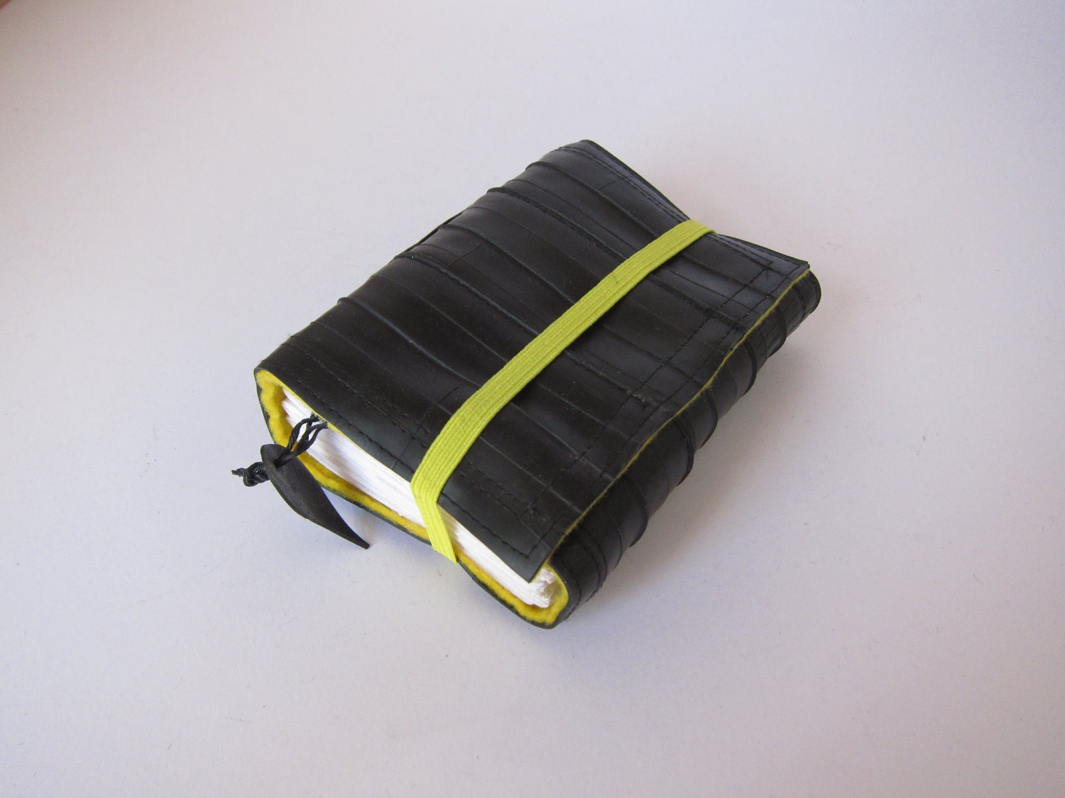Recycled journal black bike inner tube, blank, small.