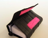 Recycled journal, bike inner tube, blank pages, black linen and neon pink velcro closure, small.