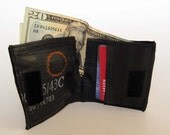 Recycled bike inner tube bifold wallet with black velcro closure and black linen