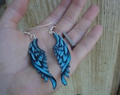 tattoo style earrings blue wings