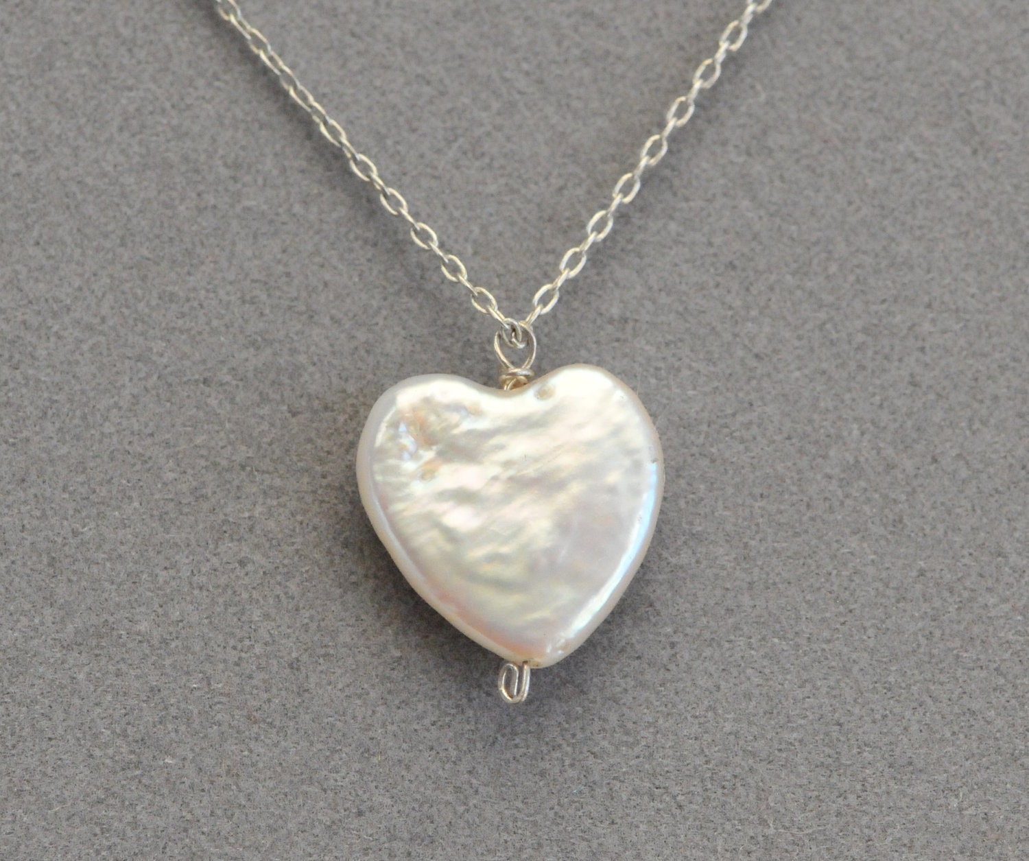 pearl heart necklace on silver chain