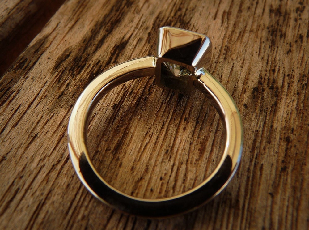 14 karat Pink gold and Moissanite Engagement ring
