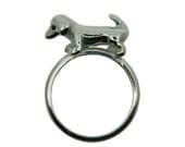 Sausage Dog Dachshund Ring. Hand crafted in Silver with Black Diamond eyes.