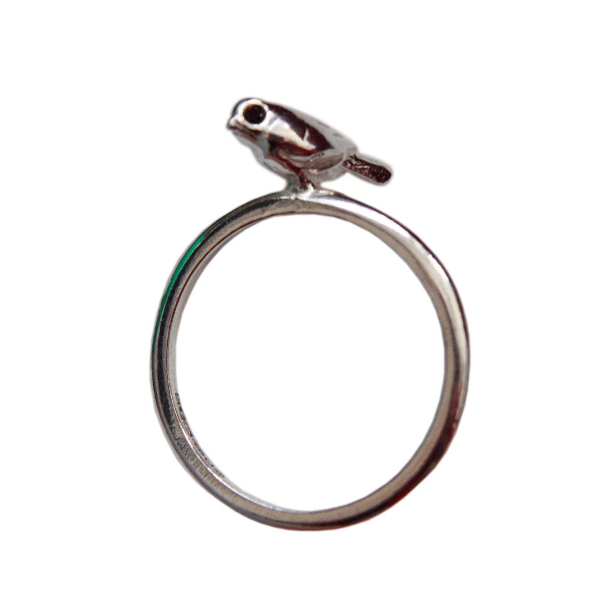 Tiny Bird. silver ring set with black diamond eyes.