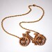 Wooden Bicycle Necklace, Laser cut in Birch wood on gold plate chain.