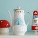 Large little village and peacock teapot