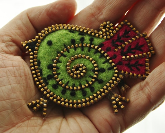 Lime green and magenta felt and zipper bird brooch.