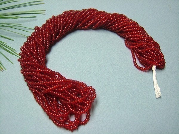 One hank of Czech Transparent Ruby seed beads - 0106 size 10