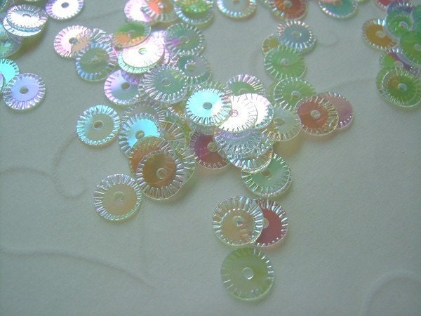 7g of 5 mm Round Wheel Sequins in Clear Iridescent Color