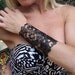 Cuff "Floral" in black leather 6-1/2" wrist