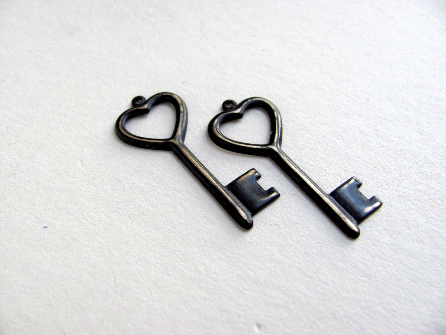 2 Antiqued Brass Skeleton Keys Black Charms