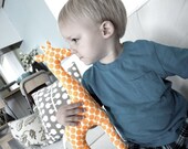 giraffe stuffed toy. tangerine polka dots