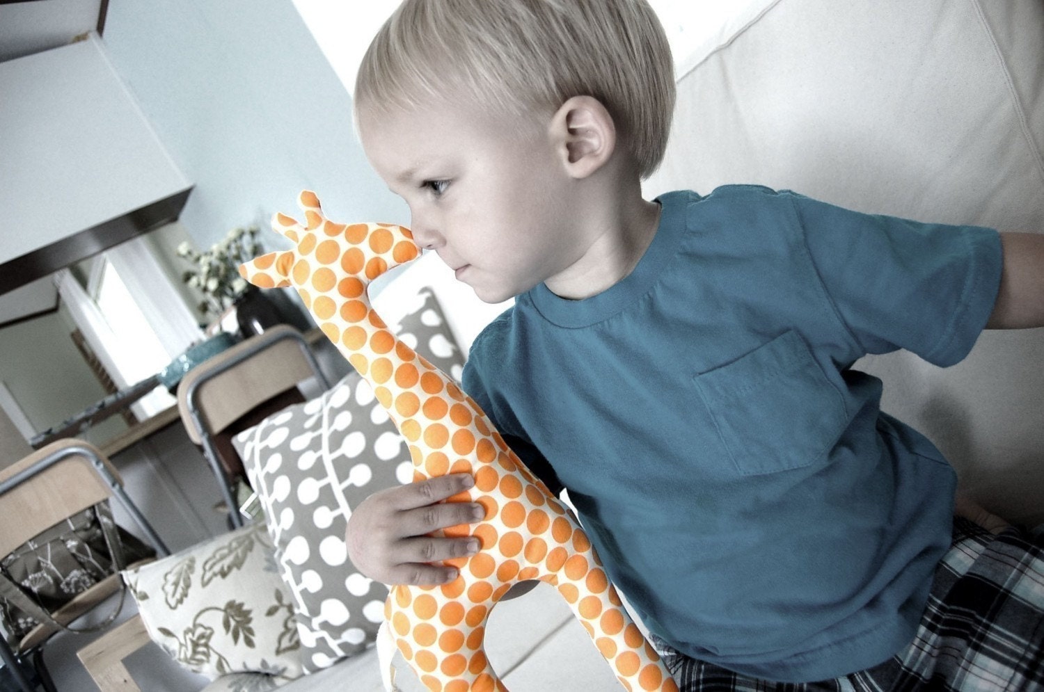 giraffe stuffed toy. tangerine polka dots