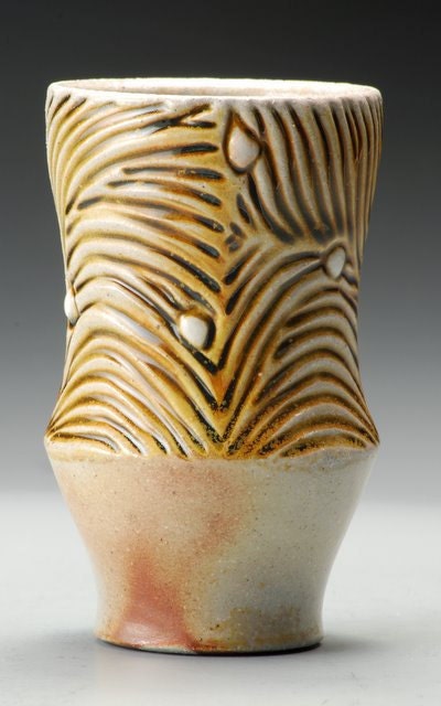 Carved Cup, honey amber glaze contrasted with earth tones, hand carved, wood fired