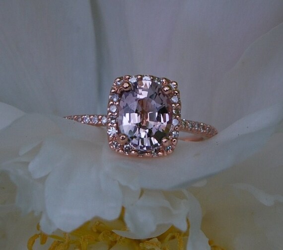 Cushion 14k rose gold diamond ring with a color change sapphire