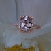 Cushion 14k rose gold diamond ring with a color change sapphire