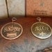 Bone, Fleur de lis, paw prints dog pet id tag. 1" custom etched brass, copper, nickel dog tag.