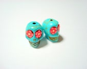Red Flower Eyes in Small Turquoise Day of The Dead Skull Beads-12mm