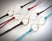 Sterling Infinity bracelet on linen