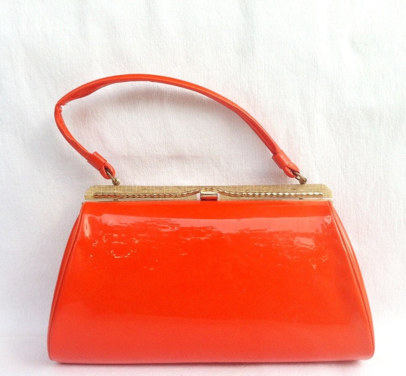 Unique shiny orange patent vinyl frame style handbag with black satin lining and gold clasp, vintage 1960's  - Free Shipping