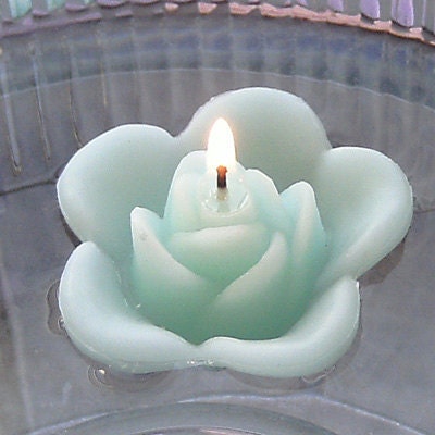 12 Mint green floating rose wedding candles for table centerpiece and reception decor.
