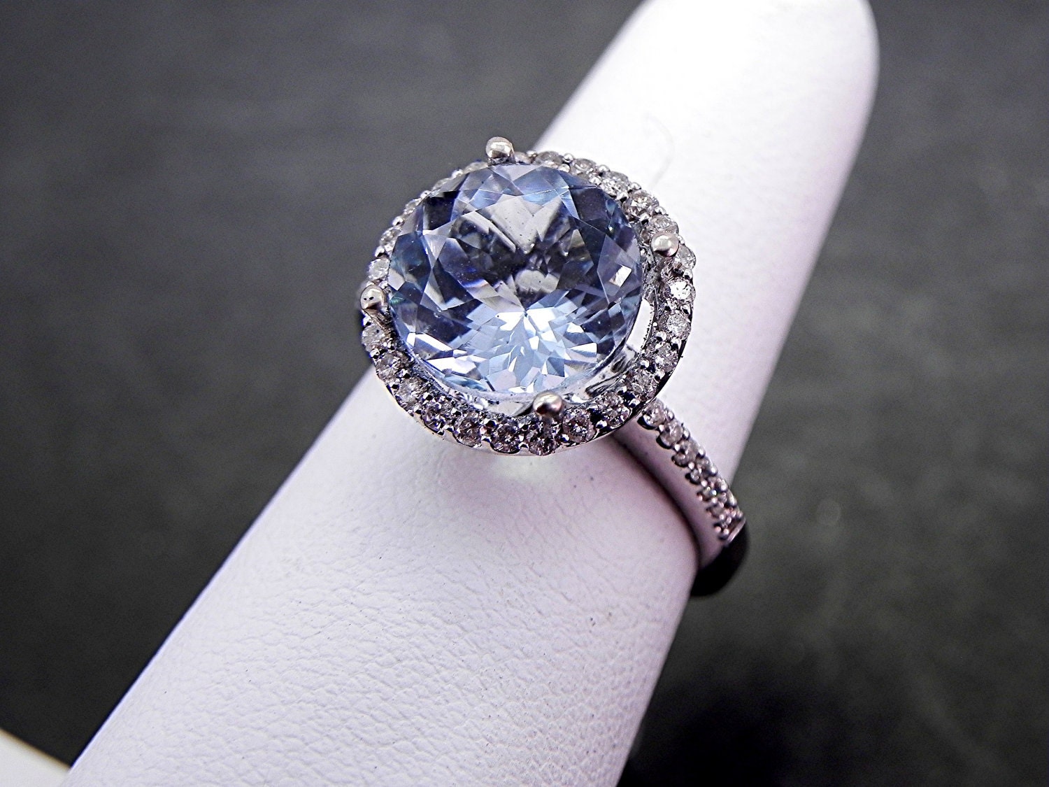 AAA Natural Untreated 11mm Round  Aquamarine (4.06ct) set in 14K white gold Halo ring with .50 carats of diamonds