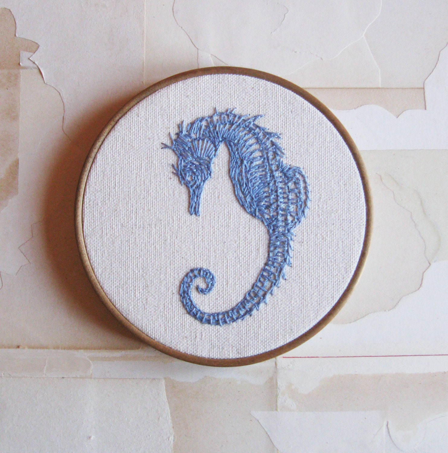 hand embroidered sea horse in blue
