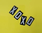 XOXO Magnets.  Repurposed Sign Letters
