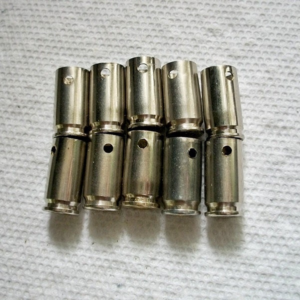 Bullet shell casing pendants, Lot of 10 Nickel silver 9mm Bullet Shell Casings...Pre-drilled holes for jewelry making....Lot 302