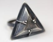the witches. triangular mouse bone ring.